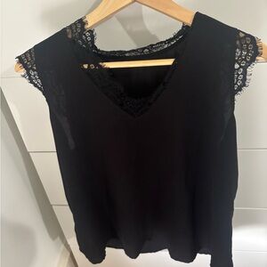 Chic Black Blouse with Elegant Design